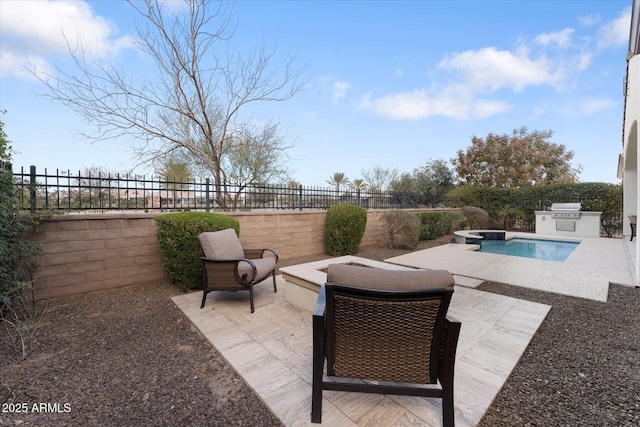 view of patio / terrace featuring exterior kitchen