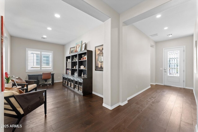 entryway featuring dark wood-type flooring