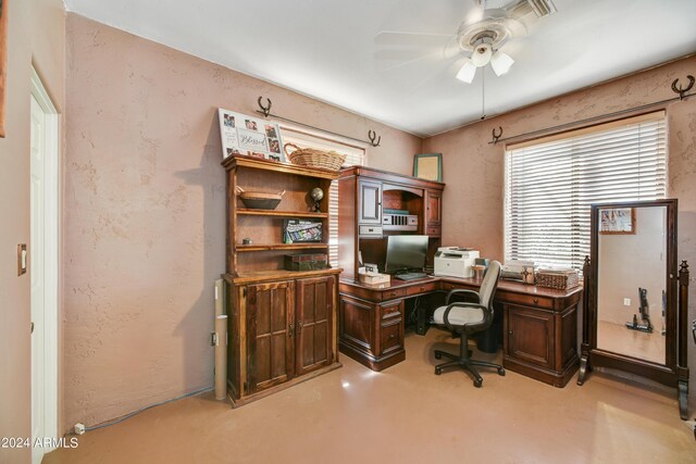 bedroom featuring concrete flooring and ceiling fan