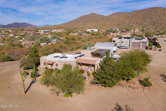 drone / aerial view featuring a mountain view