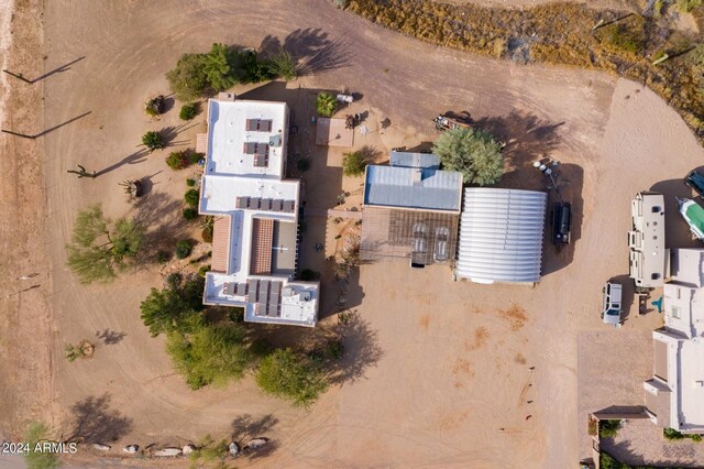 birds eye view of property featuring a mountain view