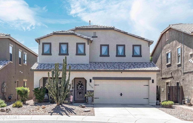 view of front of home with a garage