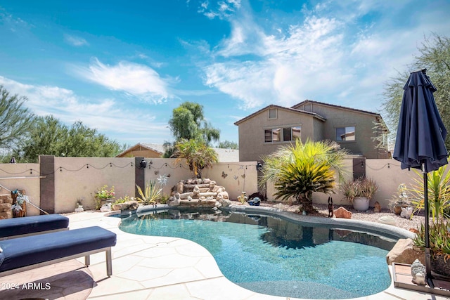 view of pool with a patio area