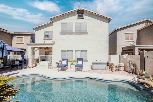 view of pool featuring a patio