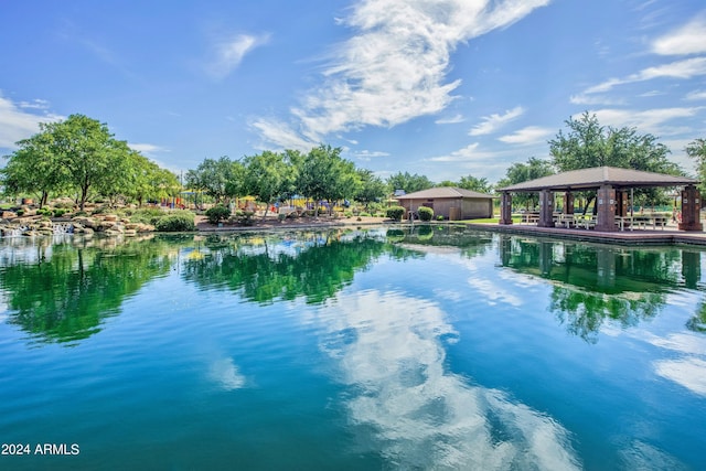 property view of water with a gazebo