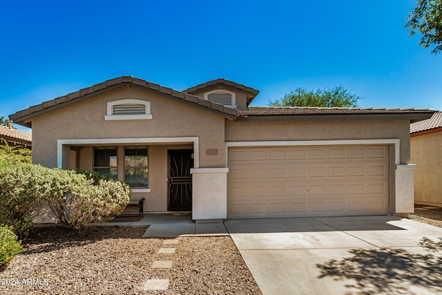 view of front of house with a garage