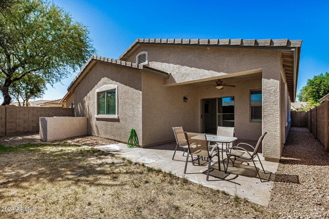 rear view of house featuring a patio and ceiling fan