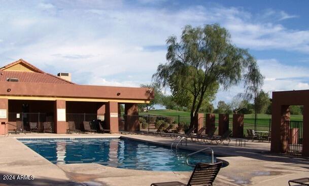 view of swimming pool with a patio