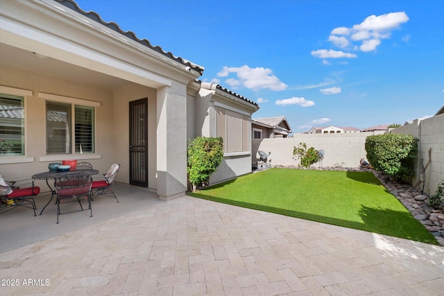 view of patio / terrace featuring a fenced backyard