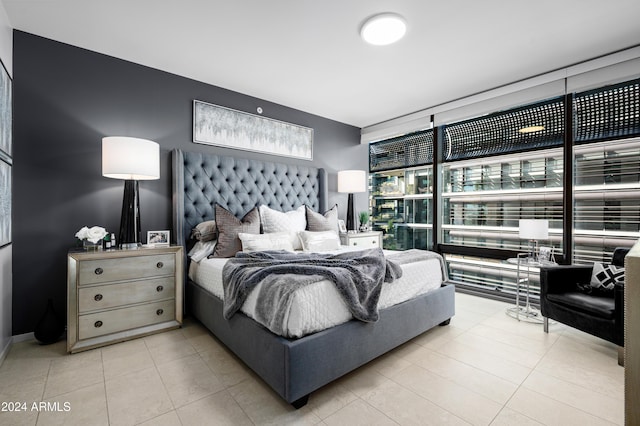 bedroom featuring tile patterned flooring