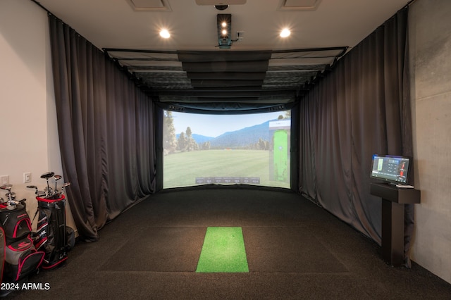 game room with golf simulator and recessed lighting