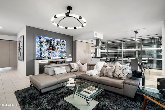 living area with light tile patterned floors and visible vents