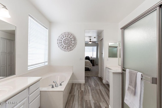 bathroom with vanity and plenty of natural light