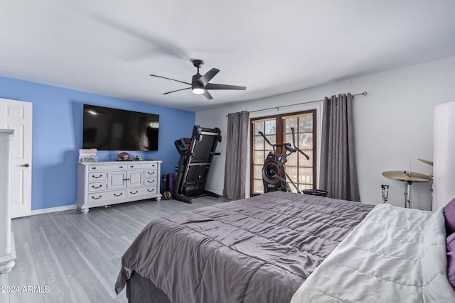 bedroom featuring ceiling fan and light hardwood / wood-style floors