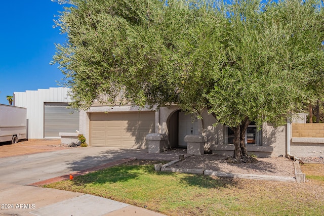 view of front of property with a garage