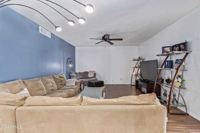 living room featuring ceiling fan