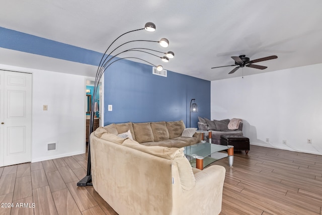 living room with ceiling fan