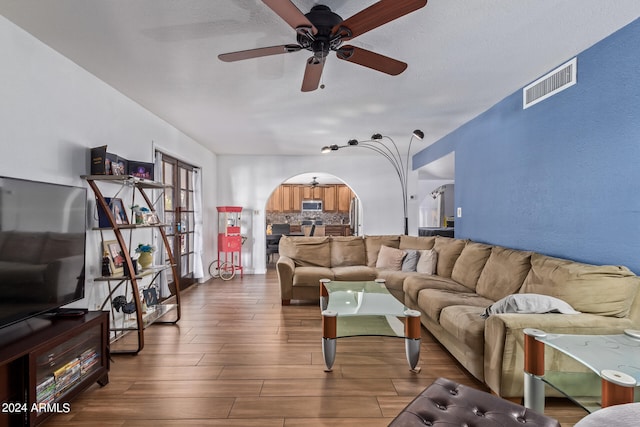 living room with ceiling fan