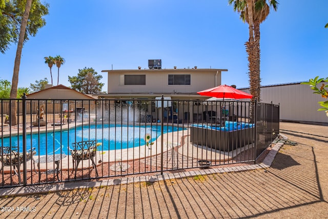 view of swimming pool featuring a patio