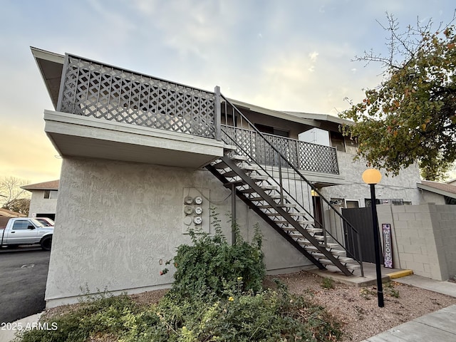 view of property exterior at dusk