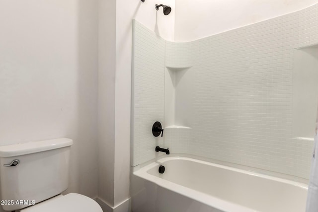 full bathroom with toilet and bathtub / shower combination