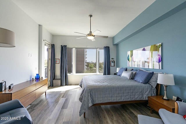 bedroom with wood finished floors and ceiling fan