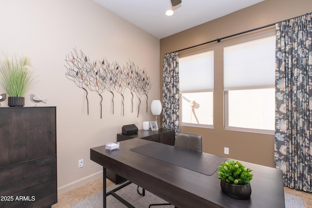 office area with light tile patterned flooring