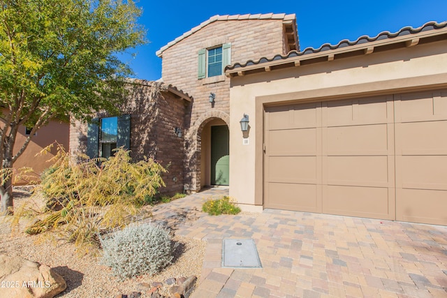 view of front of house with a garage