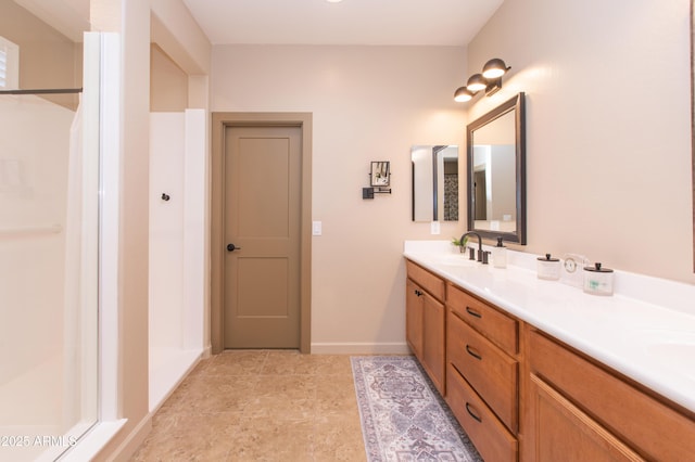 bathroom featuring walk in shower and vanity