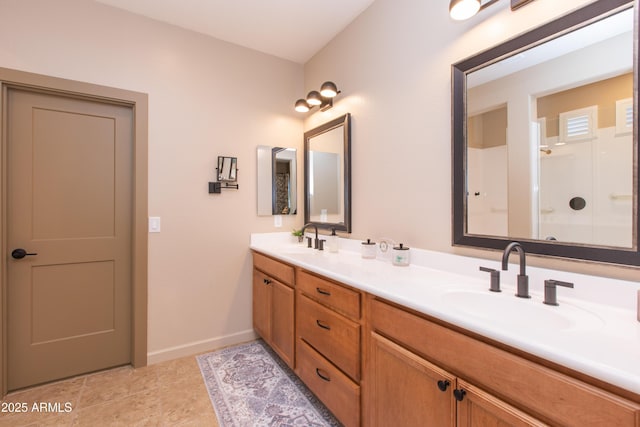 bathroom featuring walk in shower and vanity