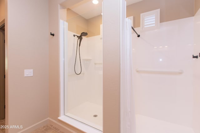 bathroom featuring a shower