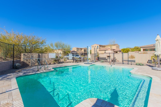 view of swimming pool featuring a patio