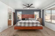 bedroom featuring ceiling fan and access to outside