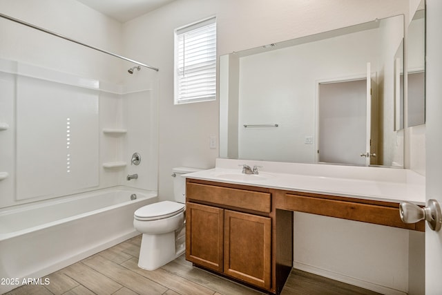 full bathroom featuring  shower combination, toilet, hardwood / wood-style floors, and vanity