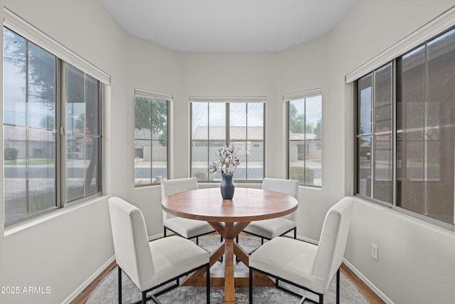 2834 E Devon Ct, Gilbert, AZ 85296 - dining room featuring baseboards and wood finished floors