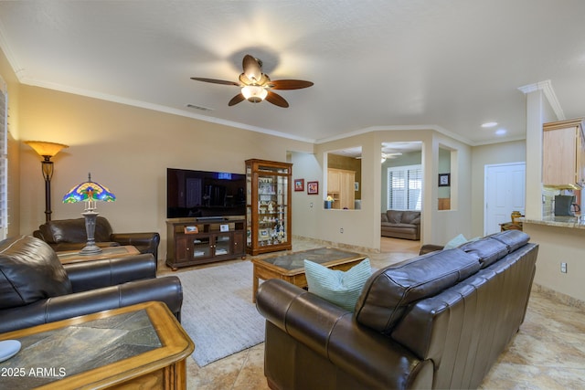 living room featuring crown molding