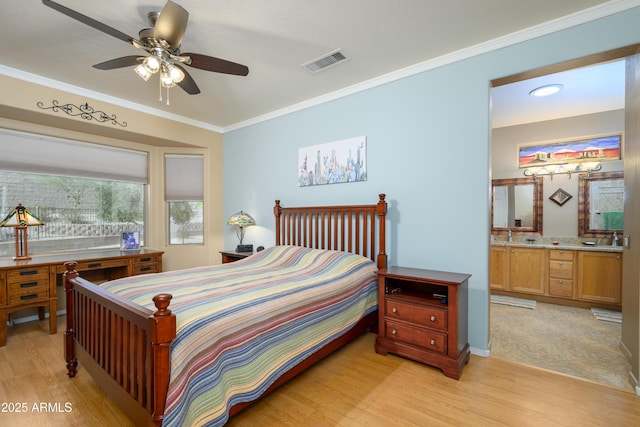 bedroom with ceiling fan, ensuite bath, ornamental molding, and light hardwood / wood-style floors