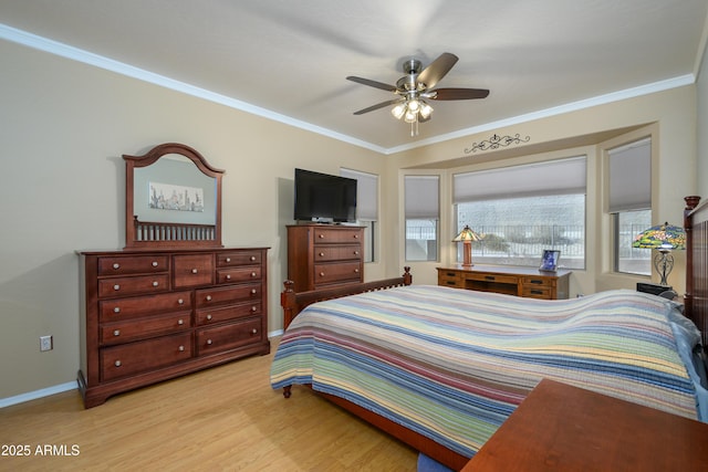 bedroom featuring ceiling fan, light wood-type flooring, and ornamental molding