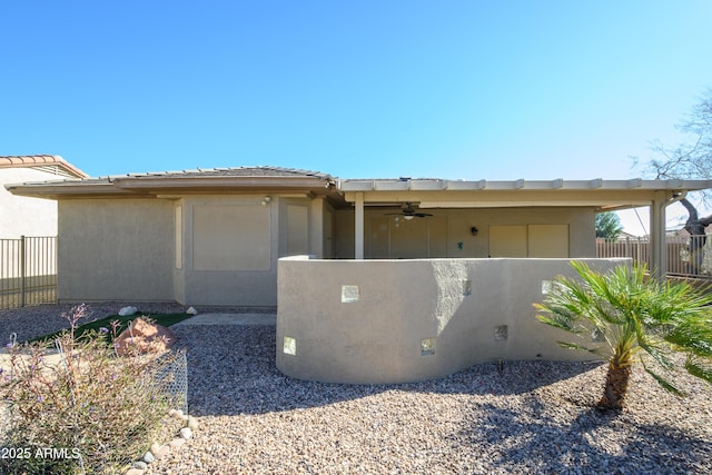 view of home's exterior with ceiling fan