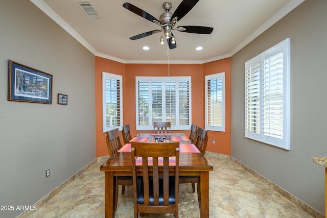 dining room featuring ceiling fan and ornamental molding