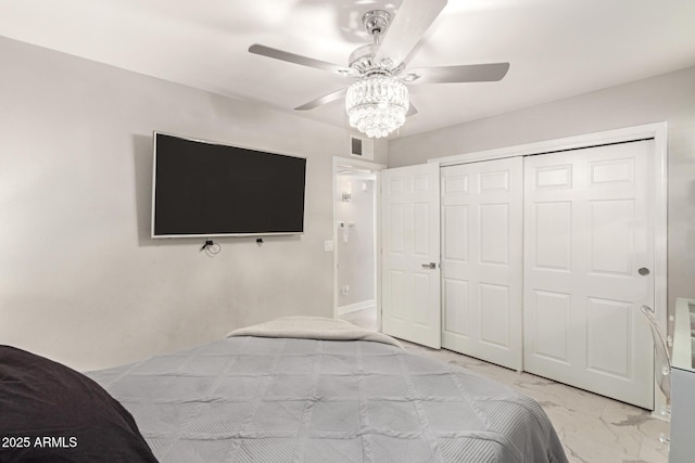 bedroom featuring a closet and ceiling fan