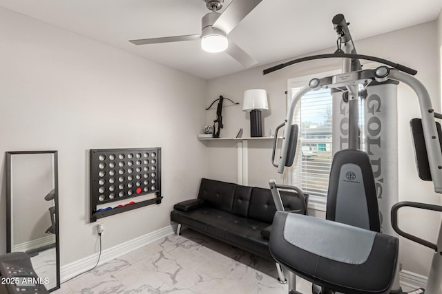 exercise room with ceiling fan