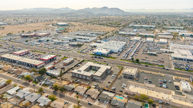 birds eye view of property featuring a mountain view