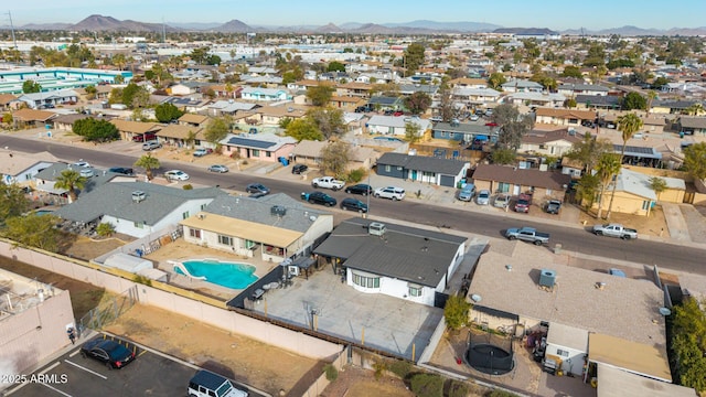 birds eye view of property featuring a mountain view