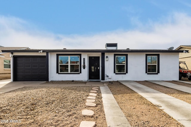 single story home with a garage