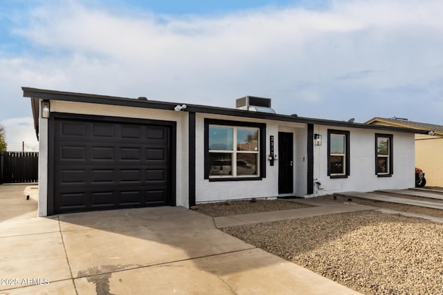 ranch-style home with a garage