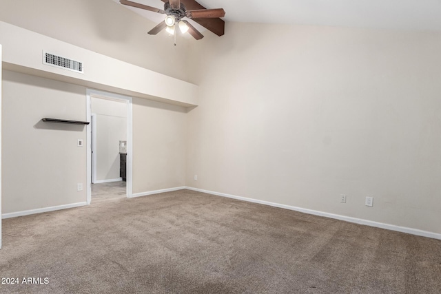 empty room with carpet floors, ceiling fan, and lofted ceiling