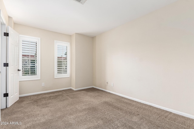 view of carpeted spare room