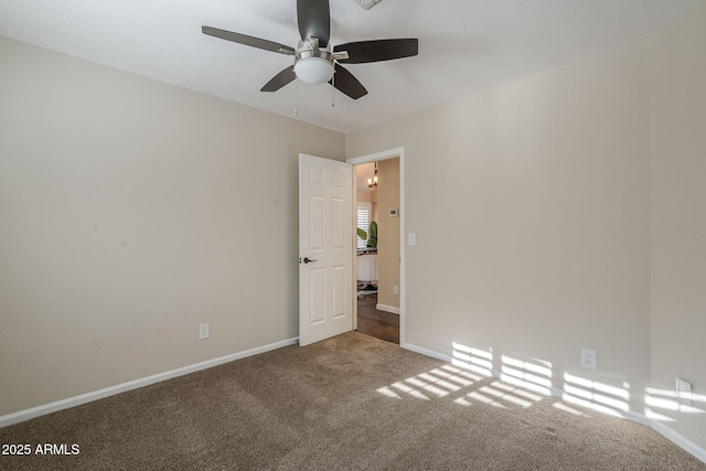 11085 E Becker Ln E, Scottsdale, AZ 85259 - spare room with ceiling fan and carpet floors