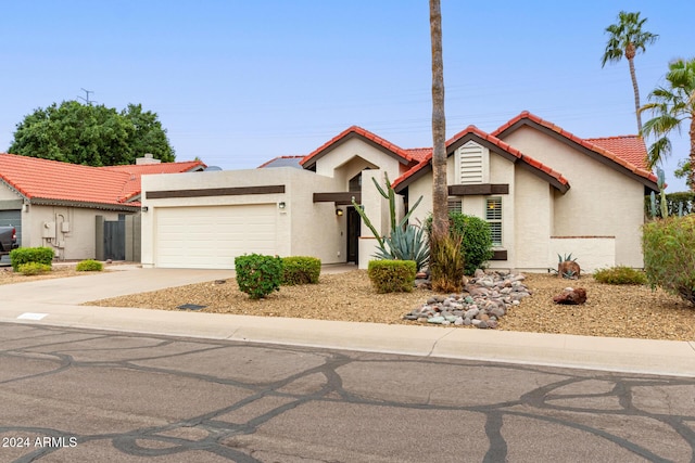 view of front of property with a garage